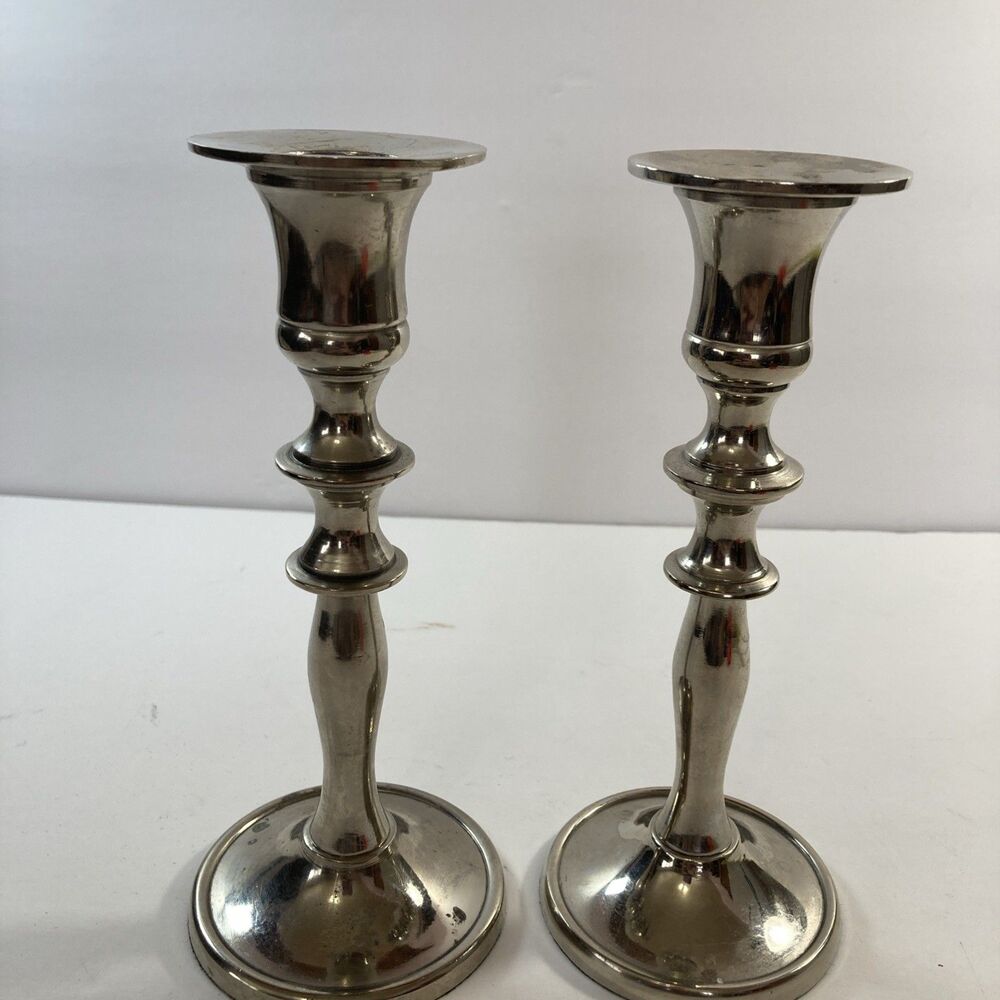 Set of 2 Silver Plated 7” Candle Stick Holders.